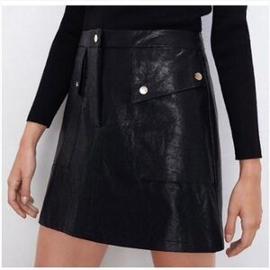 Zara faux leather mini skirt size small.